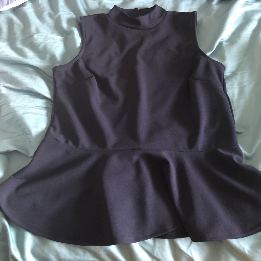 Sleeveless tank with bottom ruffles